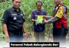 Personel-Polsek-Balongbendo-Berikan-Bantuan-Bibit-Jagung-kepada-Petani